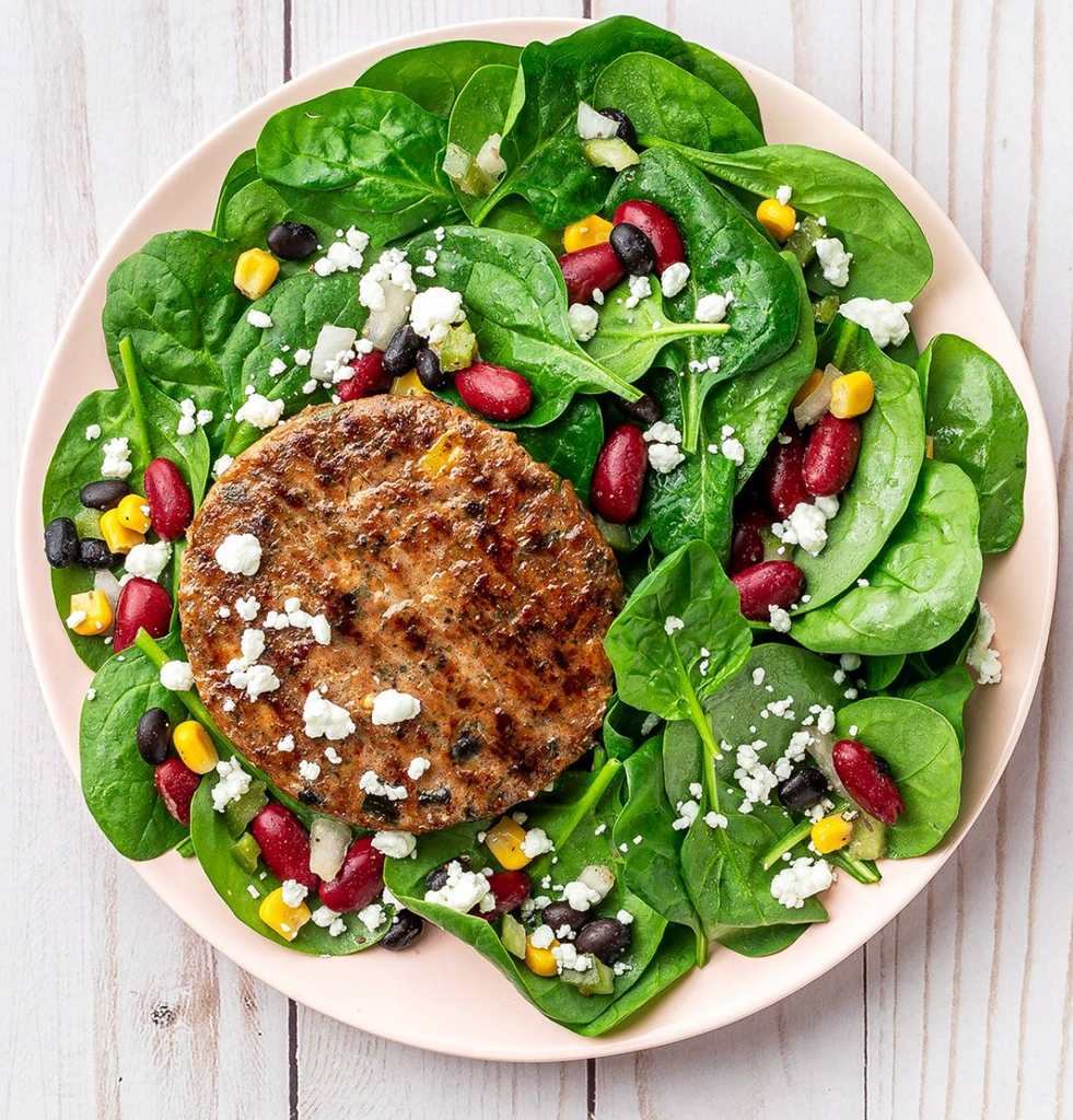 SOUTHWEST CHICKEN PATTY SALAD WITH GOAT CHEESE
